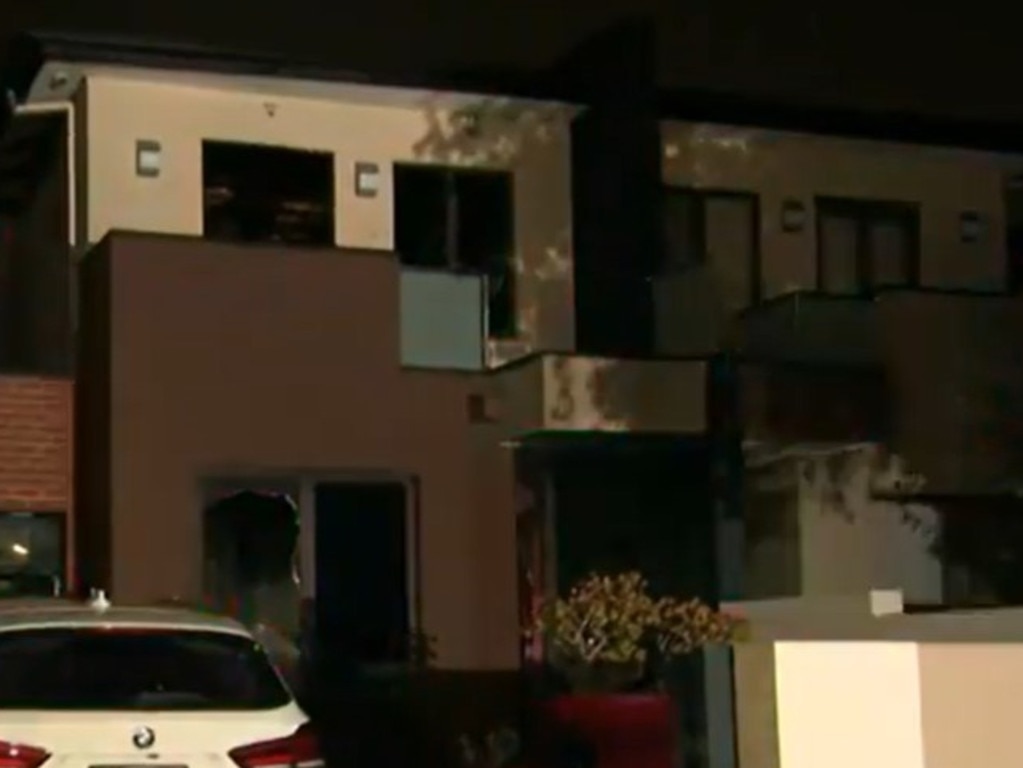 A woman has jumped from the balcony of a building after fire erupted on a two-storey house. Picture: Supplied