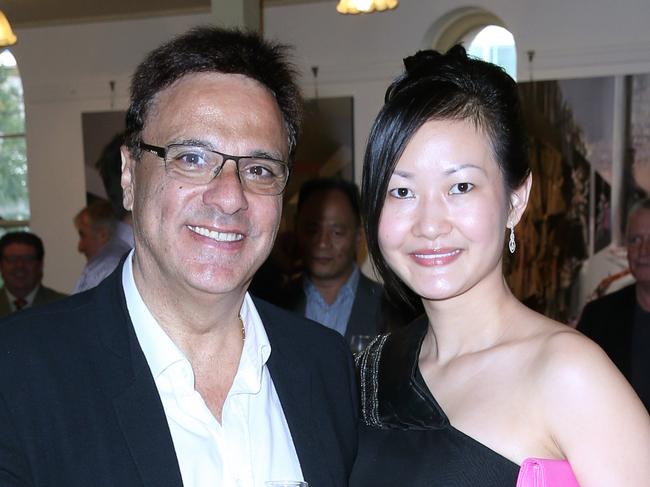 Michel and Coco Germani at the Billich Gallery Christmas Party at the Rocks  hosted by artist Charles Billich.
