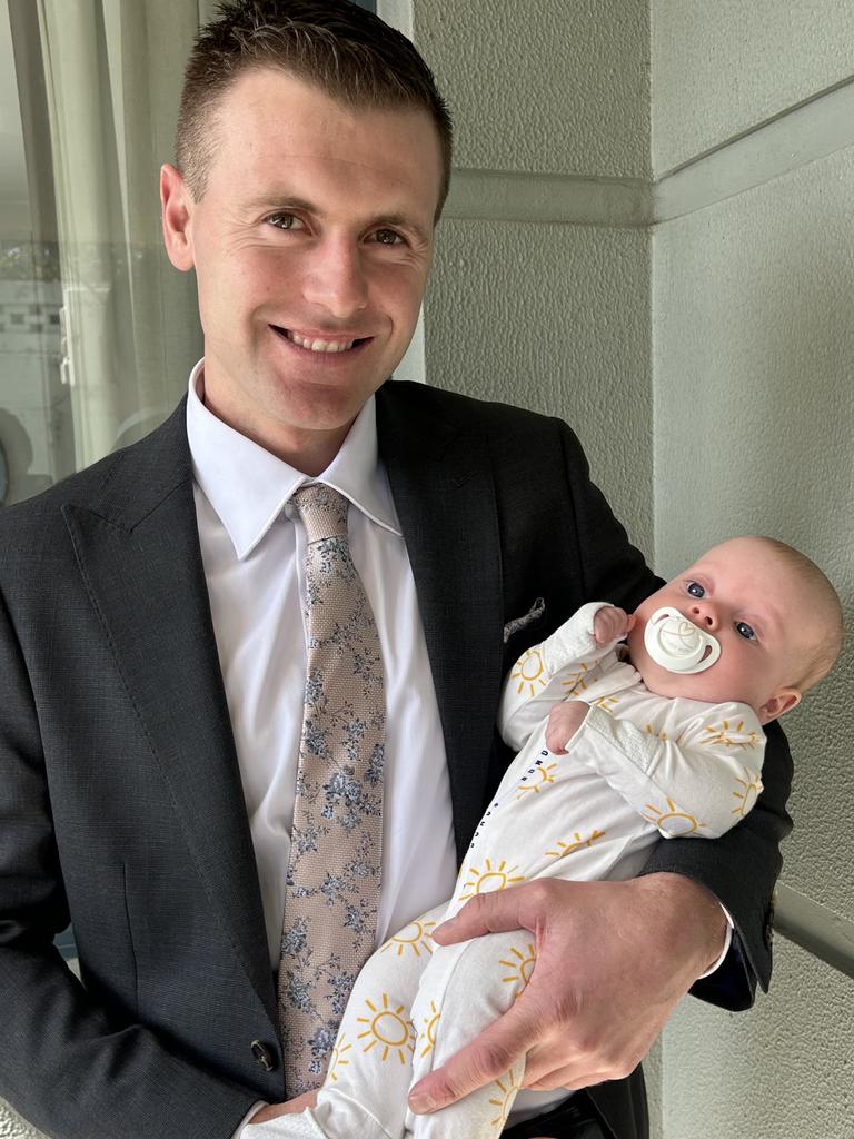 Trainer Clayton Douglas with his baby daughter Isla. Picture: Supplied by Lydia Rigg-Floyd.