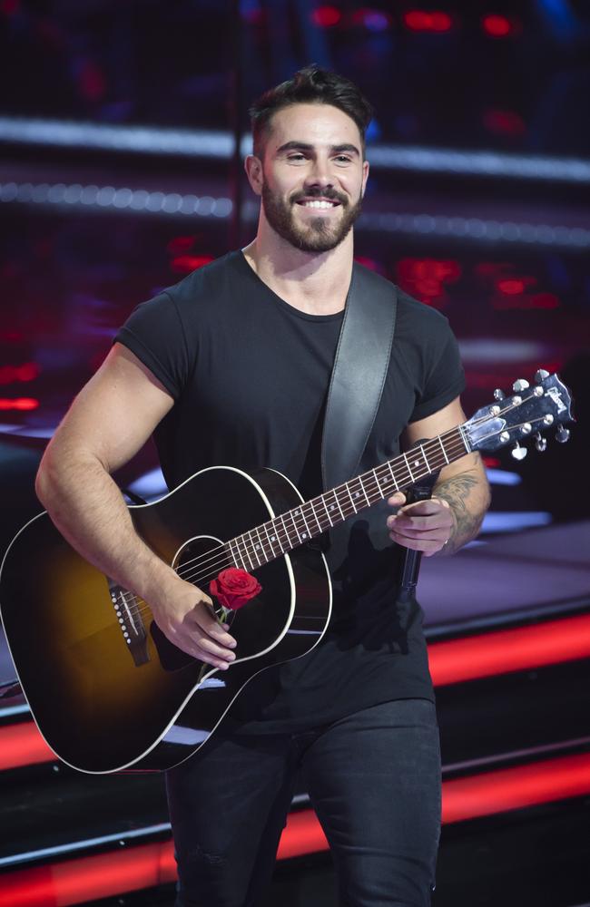 The Voice contestant Tim Conlon won a spot on #teamdelta.