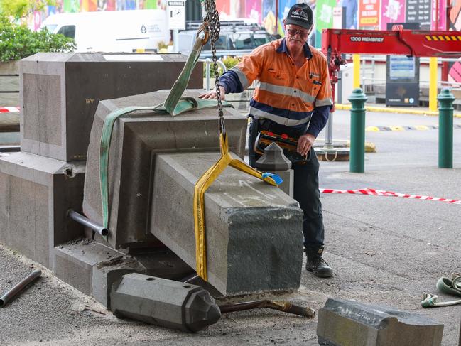 The John Batman memorial statue is removed from the Queen Victoria Market after being vandalised. Picture: Brendan Beckett