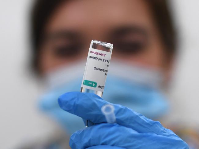 A health worker prepares a dose of the AstraZeneca vaccine. Picture: AFP