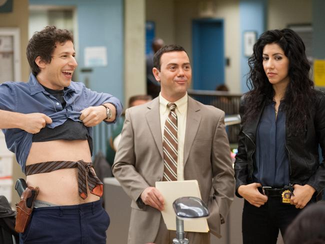 Comic cops ... Andy Samberg as Jake, Joe Lo Truglio as Charles, Stephanie Beatriz as Rosa in Brooklyn Nine-Nine. Picture Eddy Chen/NBC