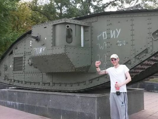 A younger Ben Stimson posing next to a tank. Picture: Supplied