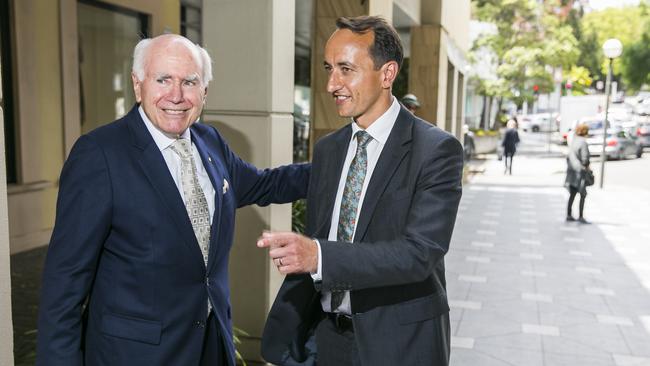 Master and apprentice: former prime minister John Howard with Liberals candidate Dave Sharma in Wentworth yesterday. Picture: Dylan Robinson