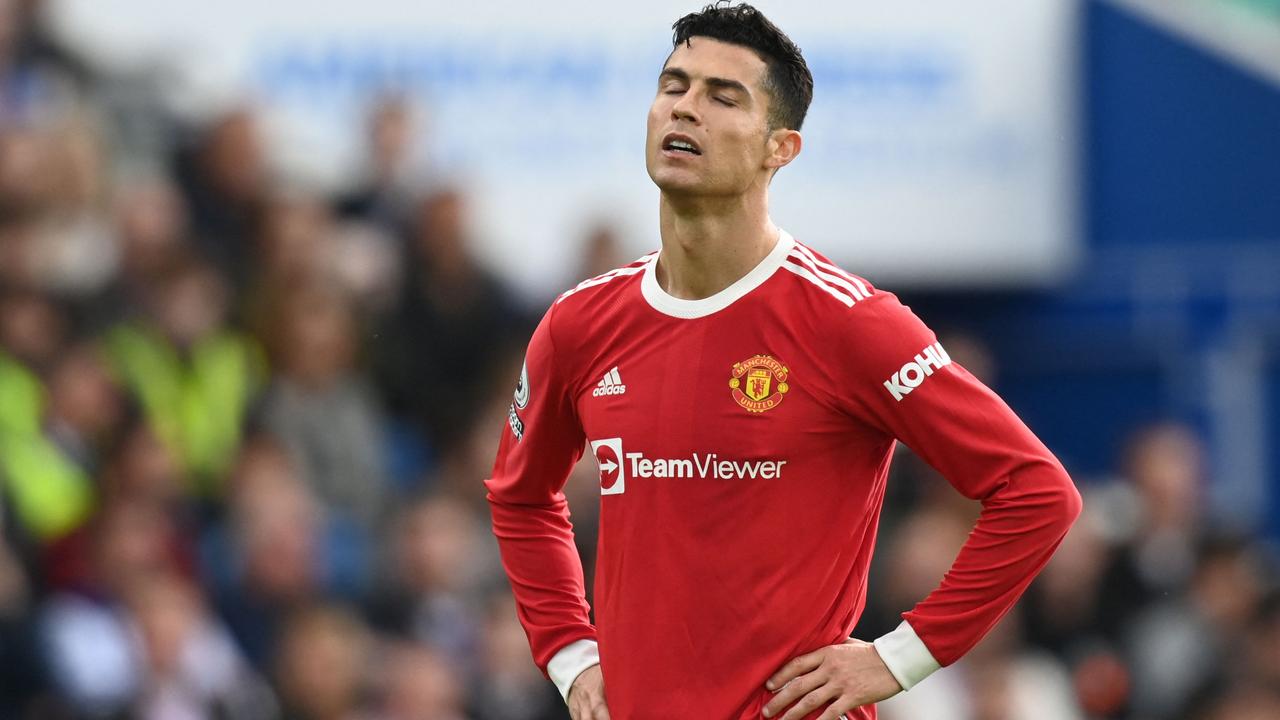 Manchester United's Portuguese striker Cristiano Ronaldo reacts during the English Premier League football match between Brighton and Hove Albion and Manchester United at the American Express Community Stadium in Brighton, southern England on May 7, 2022. (Photo by Glyn KIRK / AFP) / RESTRICTED TO EDITORIAL USE. No use with unauthorized audio, video, data, fixture lists, club/league logos or 'live' services. Online in-match use limited to 120 images. An additional 40 images may be used in extra time. No video emulation. Social media in-match use limited to 120 images. An additional 40 images may be used in extra time. No use in betting publications, games or single club/league/player publications. /
