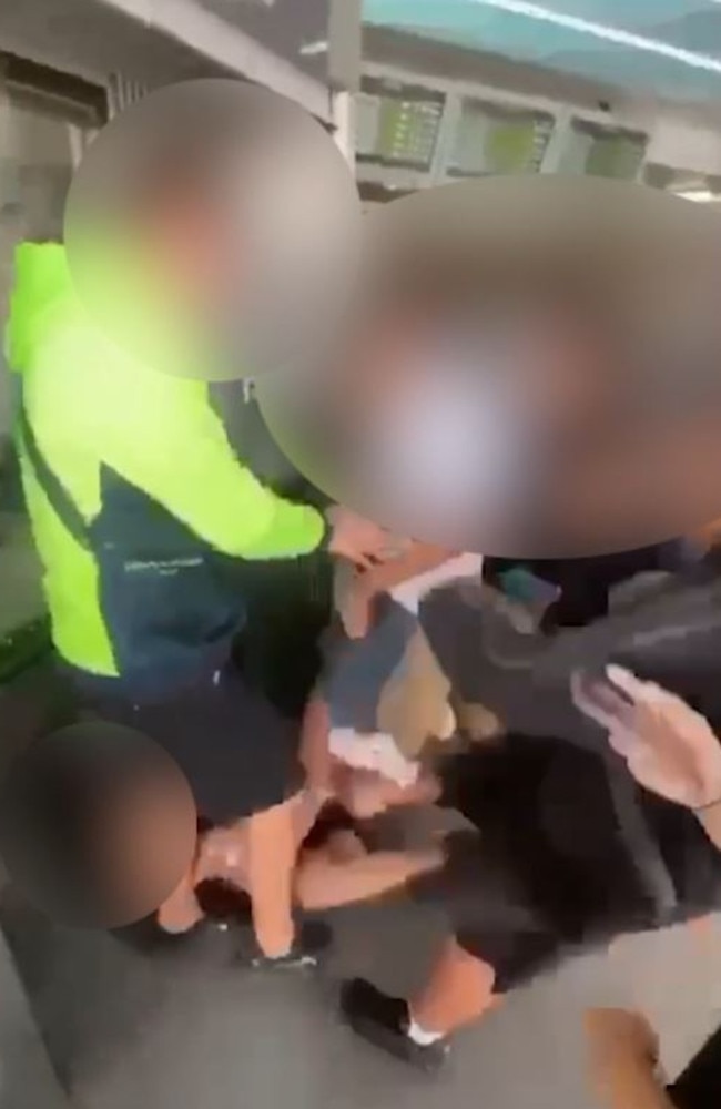 Still from shocking footage of a brutal bashing at a Gold Coast train station. Picture: Supplied