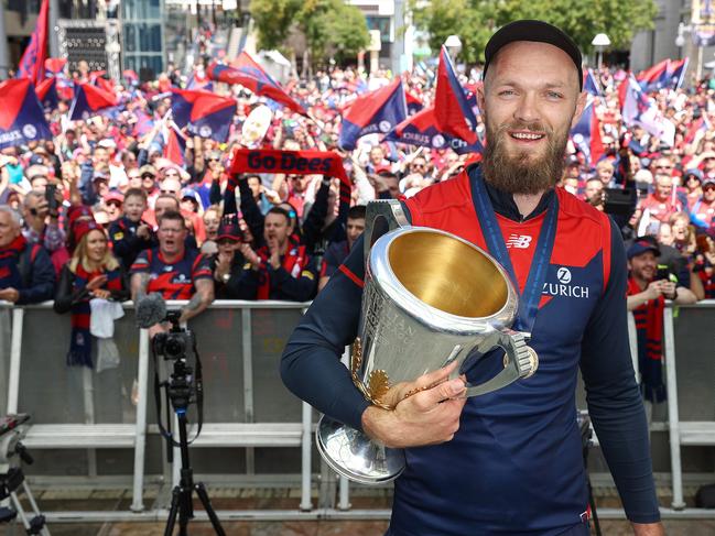 PERTH. 26/09/2021. The day after the AFL Grand Final.  Melbourne players are presented to the fans in Forrest Chase, Perth.   Captain Max Gawn hold the cup with adoring Melbourne fans behind   . Photo by Michael Klein