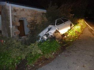 A teenage driver and his passenger are lucky to escape uninjured after crashing into a building at Mount Lofty Estate