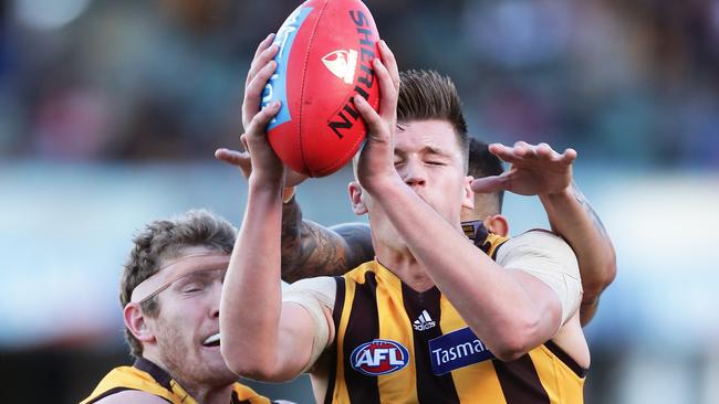 Mitch Lewis flies high to pull down a pack mark during Hawthorn’s victory. Picture: Matt King/Getty Images.