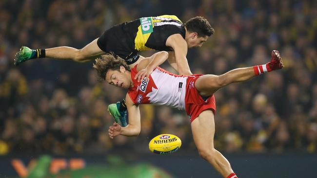 Richmond Jason Castagna gets tangled up with Sydney’s Oliver Florent. Picture: Adam Trafford/AFL Media/Getty Images