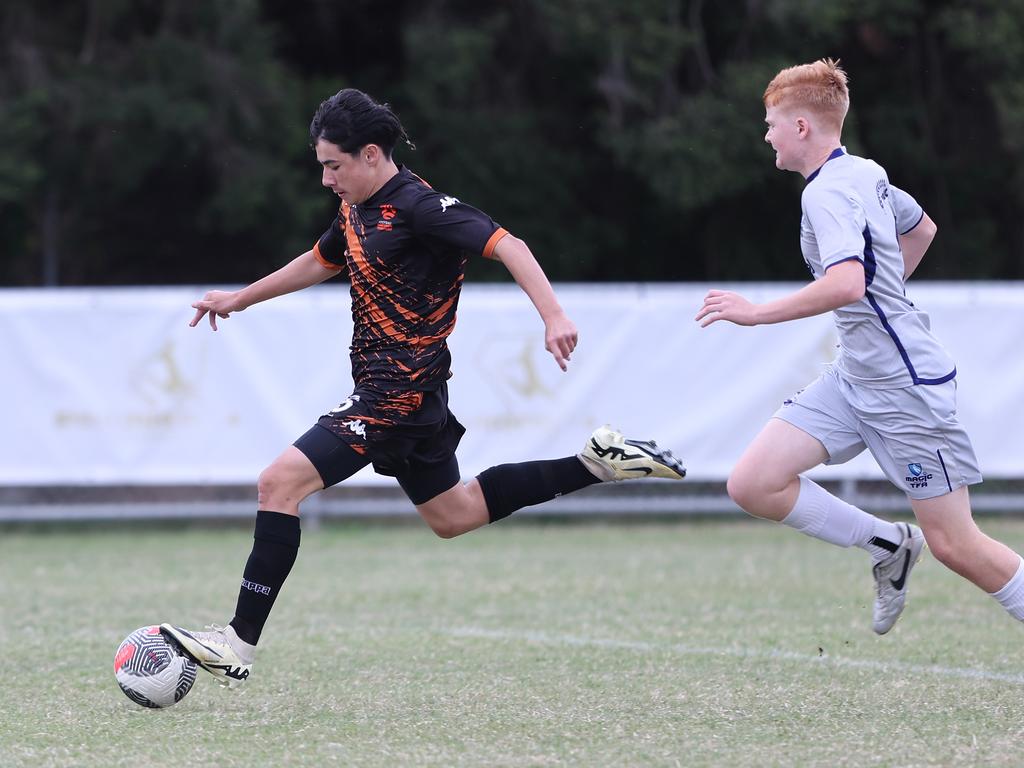 Premier Invitational Football 2024 tournament at Glennon Park Nerang. Field 2...Magic Utd (grey) V Football NT Utd. Picture Glenn Hampson