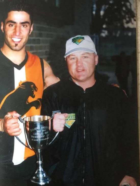 Northcote Park captain Matt Amad and coach Vinny Hanlon with the premiership cup in 2001. Picture: Supplied