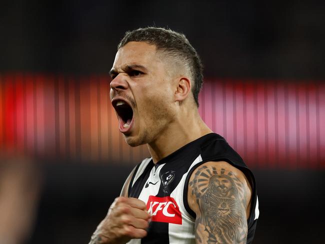 MELBOURNE, AUSTRALIA - JUNE 16: Bobby Hill of the Magpies celebrates a goal during the 2024 AFL Round 14 match between the North Melbourne Kangaroos and the Collingwood Magpies at Marvel Stadium on June 16, 2024 in Melbourne, Australia. (Photo by Michael Willson/AFL Photos via Getty Images)