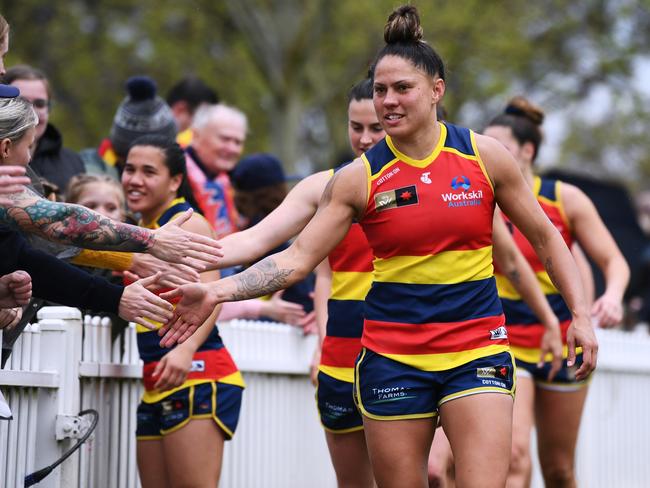 ADELAIDE, AUSTRALIA – SEPTEMBER 25: Stevie-Lee Thompson of the Crows thanks the fans after the round five AFLW match between the Adelaide Crows and the Greater Western Sydney Giants at Wigan Oval on September 25, 2022 in Adelaide, Australia. (Photo by Mark Brake/Getty Images)