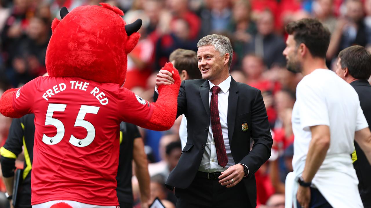 Manchester United manager Ole Gunnar Solskjaer with the Manchester United mascot. Will they celebrate a Premier League title together? (Photo by Julian Finney/Getty Images)
