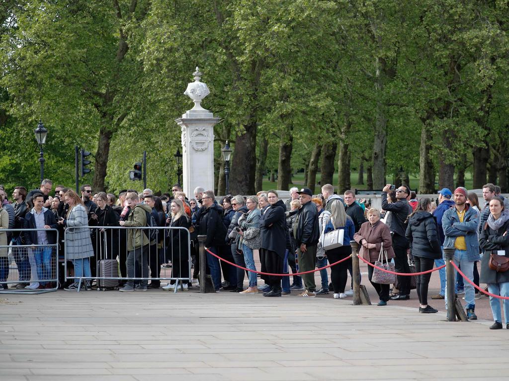 Fans descended on Buckingham Palace as the announcement was made. Picture: AFP