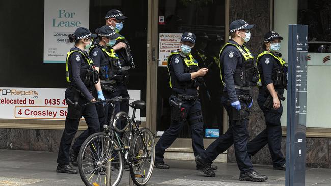 Epidemiologists say we have a one in a million chance of getting the virus, and yet police are still patrolling suburban streets. Picture: Daniel Pockett