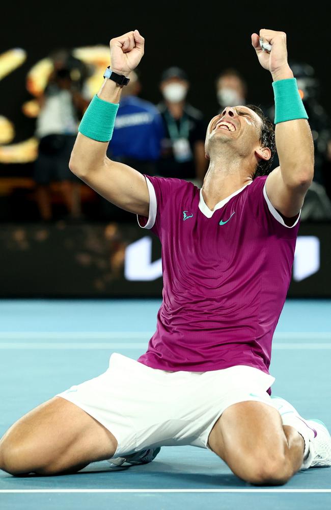 Rafael Nadal celebrates after claiming his 21st Grand Slam.