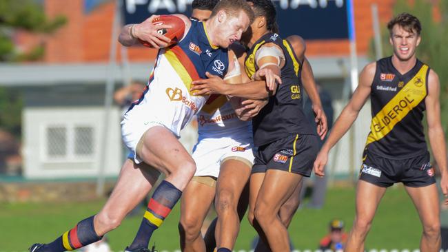 CROWS CRASH: Adelaide ruckman Reilly O'Brien is out for the season with a shoulder injury. Picture: Brenton Edwards (AAP).