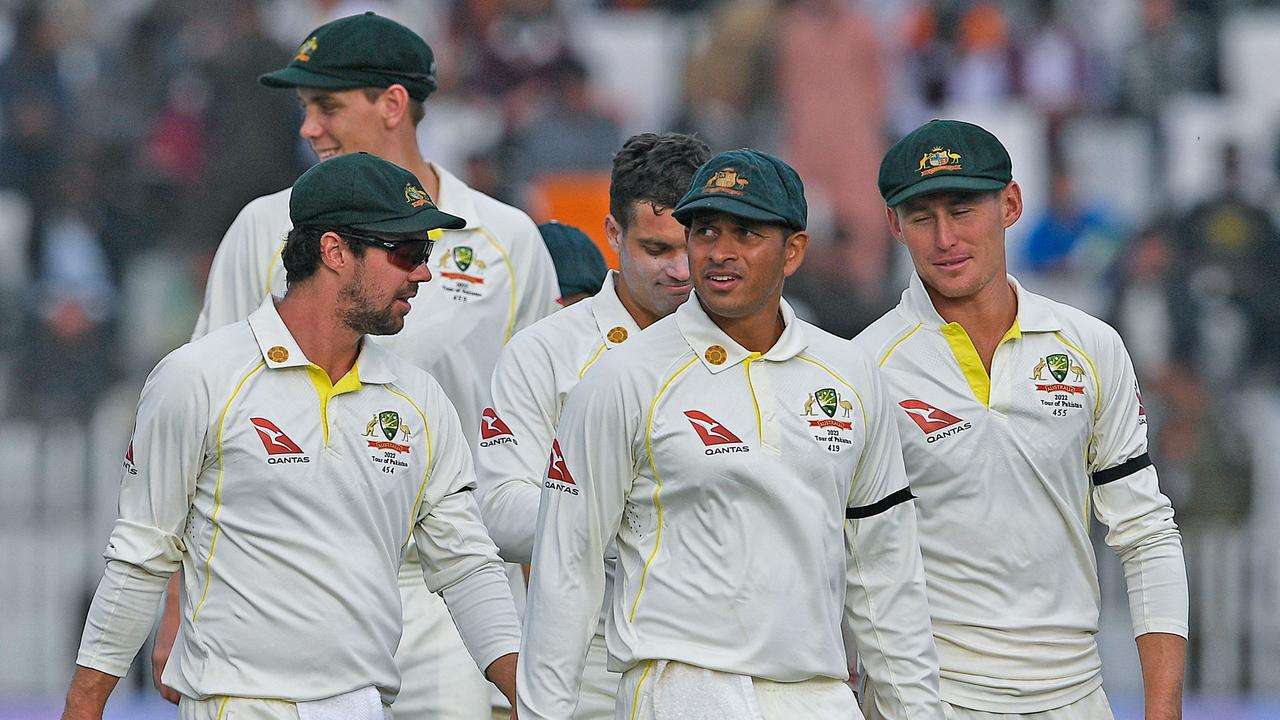Australia's players leave the ground after a draw in the first Test cricket match between Pakistan and Australia at the Rawalpindi Cricket Stadium in Rawalpindi on March 8, 2022. (Photo by Aamir QURESHI / AFP)