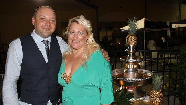 GLAMOUROUS: Airlie Beach Hotel general manager Rob Matcham and Tropical Glamour host and organiser Rachael Hohnker said Tropical Glamour in the Heart of the Reef first charity gala was a huge success. Photo: Charlotte Lam / Whitsunday Times (26/11/2014)