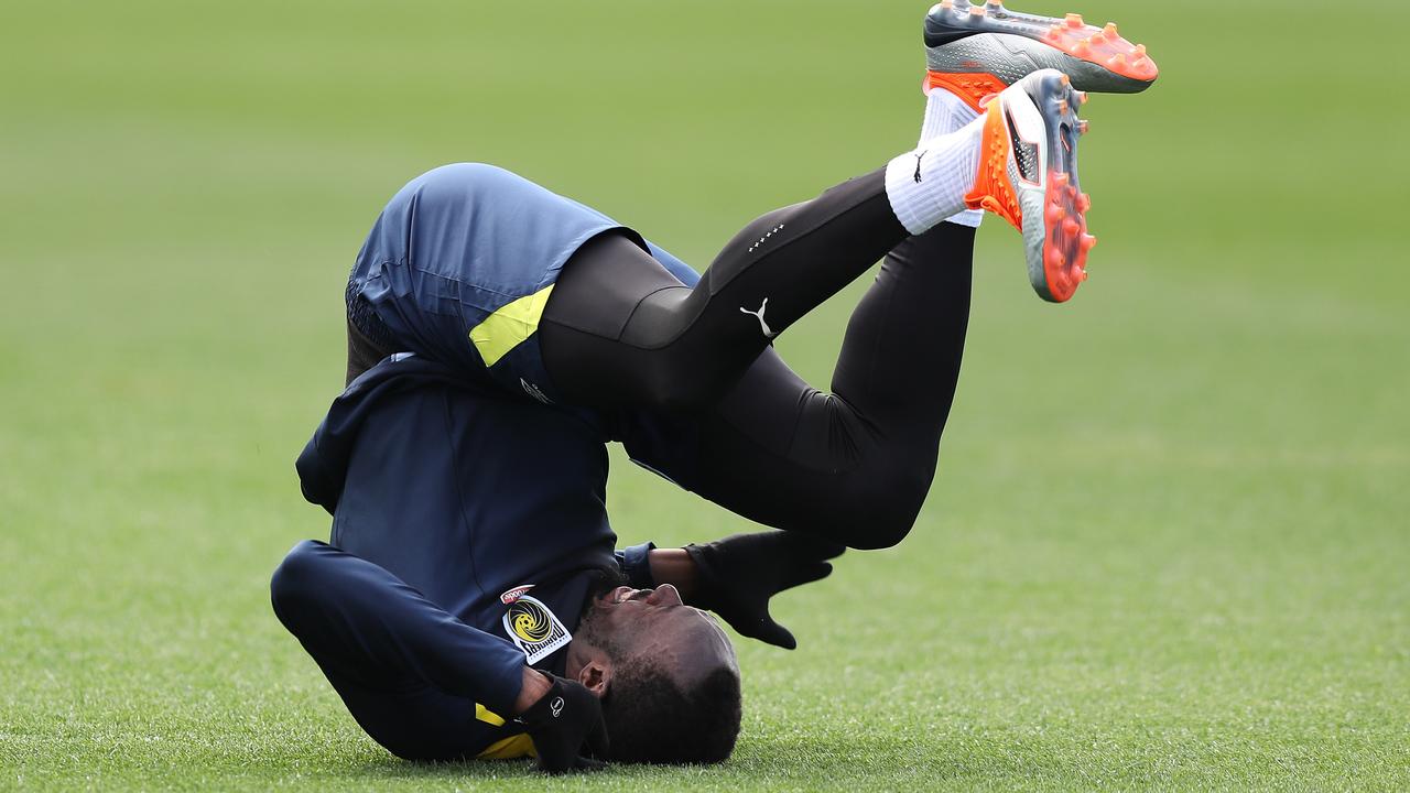 Usain Bolt takes a tumble during training.