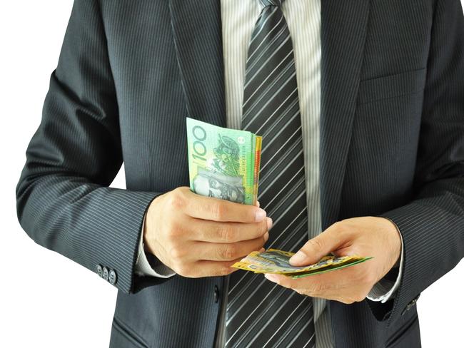 Businessman holding money  - Australian dollar bills, money generic