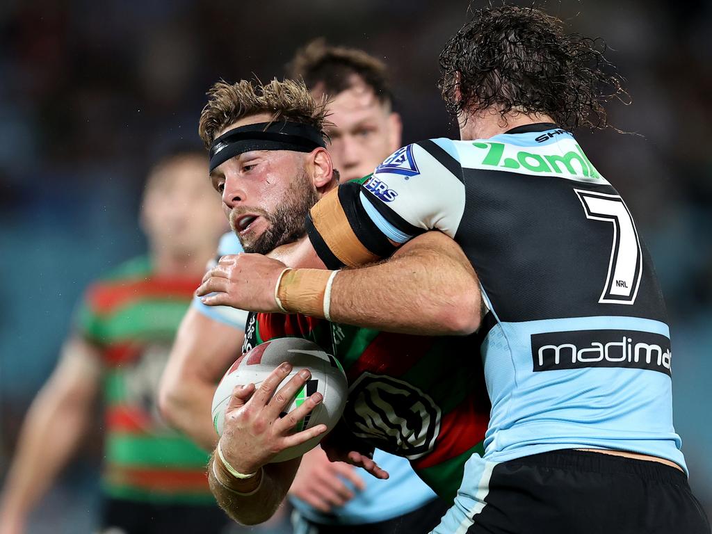 Jacob Host of the Rabbitohs is tackled by Nicholas Hynes. Photo: Brendon Thorne/Getty Images