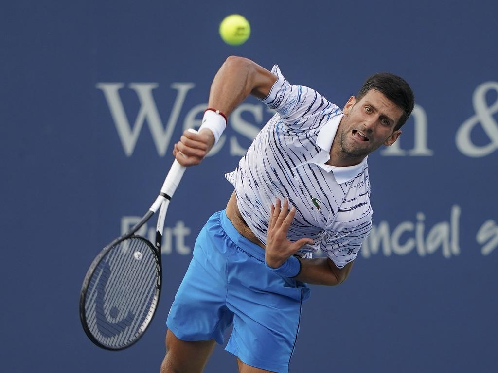 Novak Djokovic serves to Daniil Medvedev during the Western &amp; Southern Open tennis tournament in Mason, Ohio. Picture: AP Photo/John Minchillo