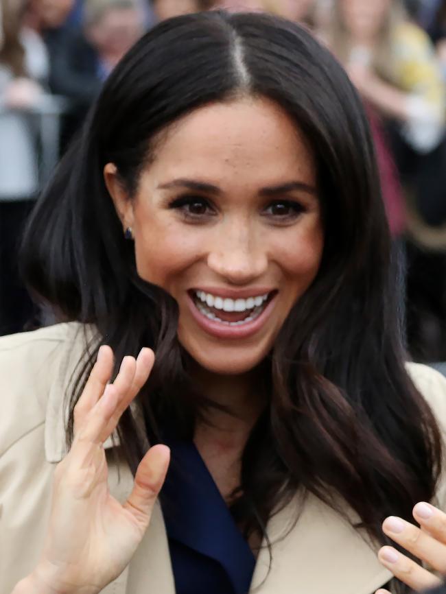 Meghan greets the crowds. Picture: Matrix