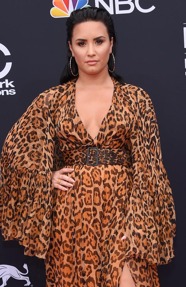 Demi Lovato looking very ‘Scary Spice meets Real Houswife’ (that is, of course, a very good thing). Picture: AFP