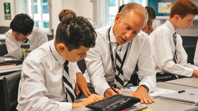 New Prince Alfred College headmaster David Roberts with pupils at his former school in Sydney, Newington College. Picture: Supplied