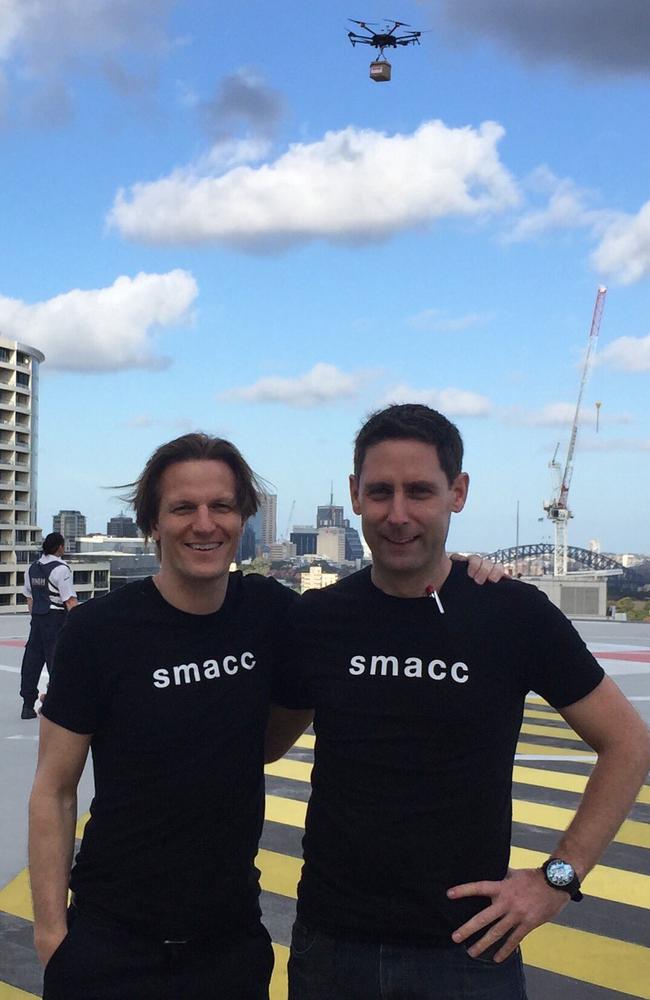 Dr Oliver Flower and Dr Brian Burns on the Royal North Shore Hospital helipad trialling the drone blood delivery.