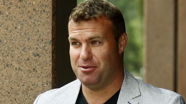 Craig Stockwell leaves Parramatta Court after sentencing on a domestic violence charge. Picture: John Appleyard