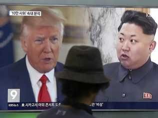 FILE - In this Aug. 10, 2017, file photo, a man watches a television screen showing U.S. President Donald Trump and North Korean leader Kim Jong Un during a news program at the Seoul Train Station in Seoul, South Korea. North Korea said Monday, Sept. 11, 2017 it will make the United States pay a heavy price if a proposal Washington is backing to impose the toughest sanctions ever on Pyongyang is approved by the U.N. Security Council this week. (AP Photo/Ahn Young-joon, File). Picture: Ahn Young-joon