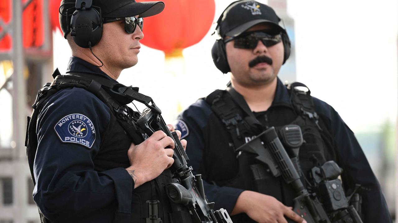 Monterey Park police officers stand at the scene of a mass shooting in Monterey Park. Picture: Robyn Beck / AFP
