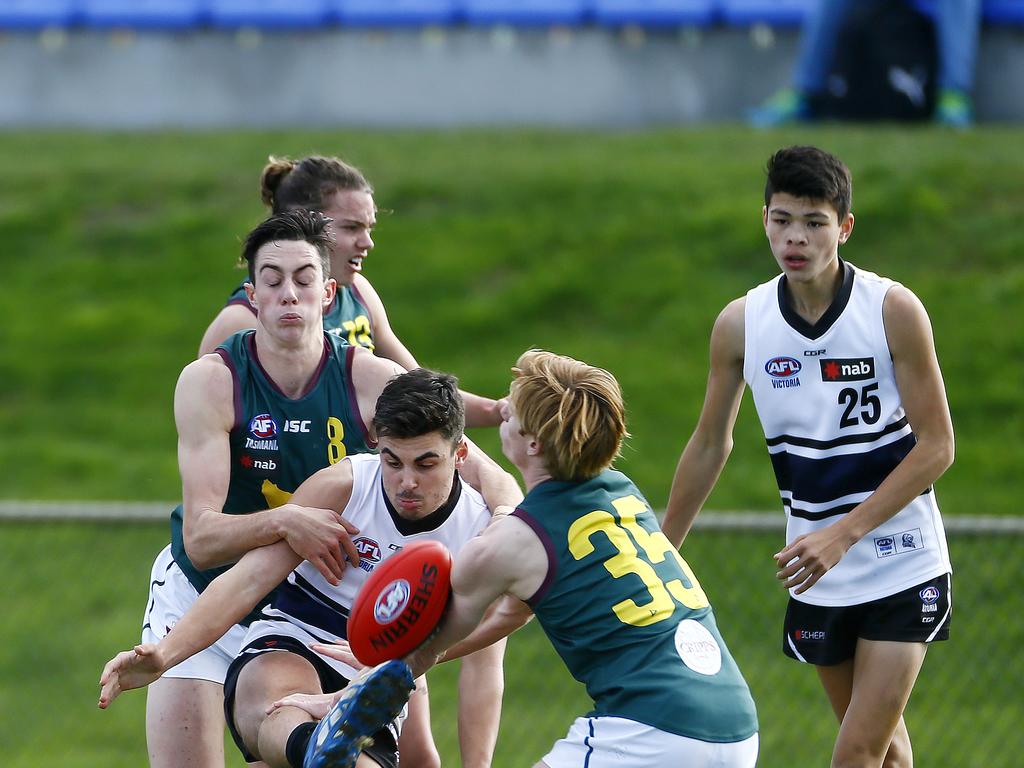 AFL - Tasmania Devils under-18 team in NAB League game against the Northern Knights at Twin Ovals, Kingston. (L-R) Jake Steele tackles. Picture: MATT THOMPSON