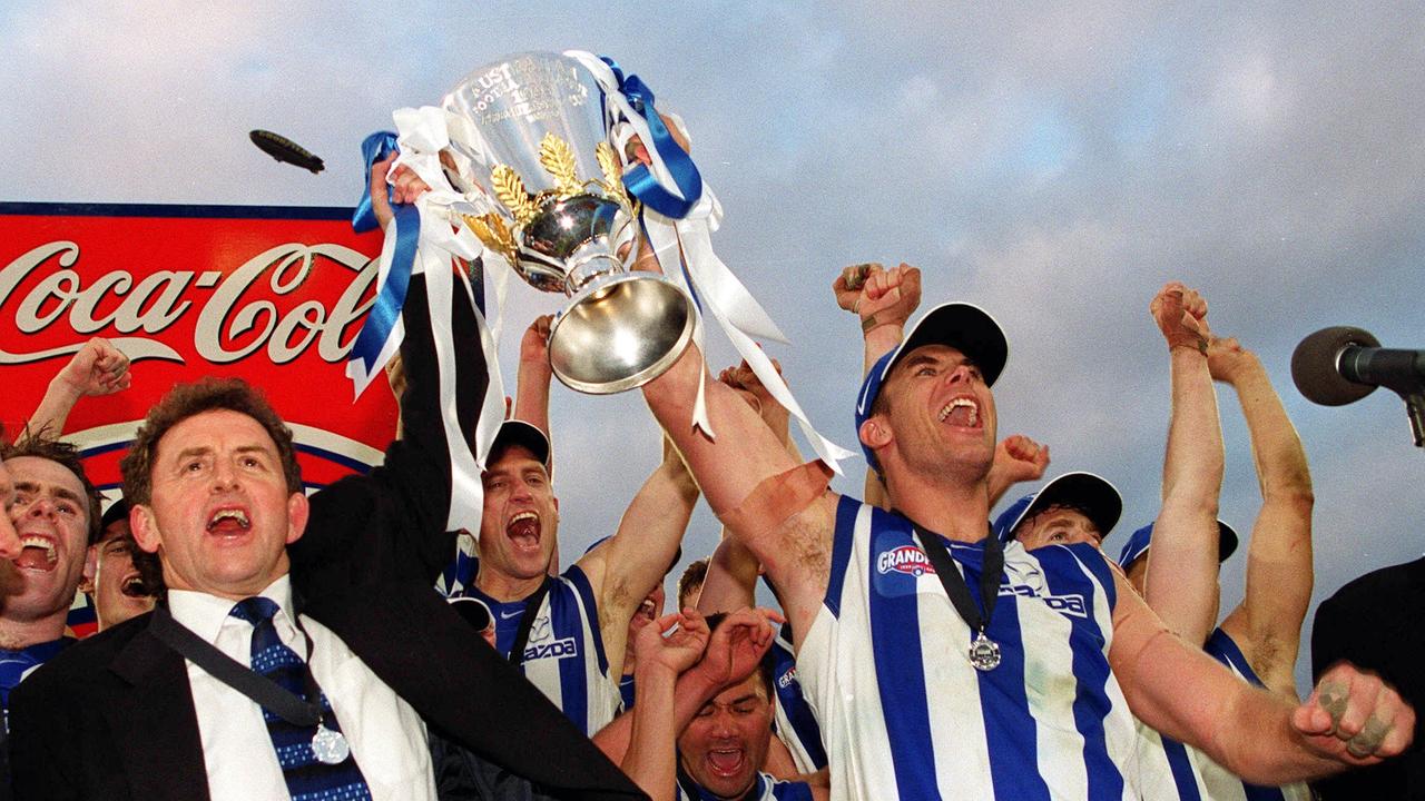 Denis Pagan and Wayne Carey lift the premiership cup in 1999.