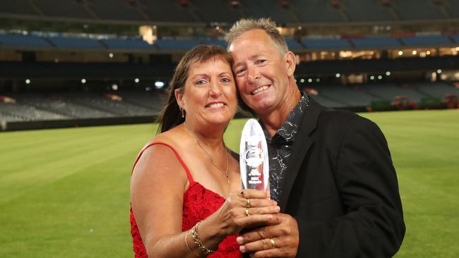 Dairy Farmers of the Year Kate and Mark Walpole family from Yielima in Victoria on the MCG. Picture: Yuri Kouzmin