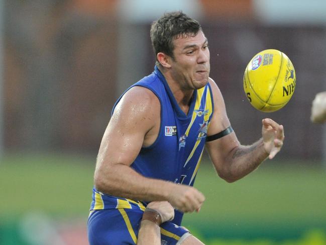 NTFL Premier League. Wanderers v Southern Districts from Marrara Stadium. Eagles Jarred Erlandson tackled by Crocs Henry Armour