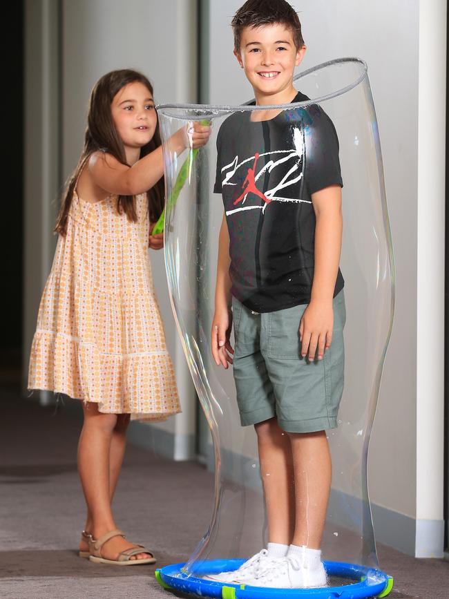 Cooper Anderson, 8, and Chloe Brown, 8, with the giant bubble maker named Toy of the Year Picture: Mark Stewart