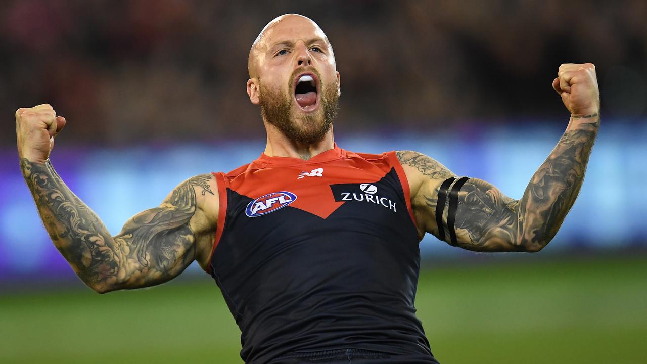 Nathan Jones celebrates booting a crucial final quarter goal to power the Demons into the second week of finals. Photo: Julian Smith/AAP Image.