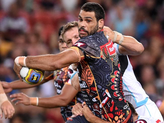 Greg Inglis on the charge for the Indigenous All Stars.