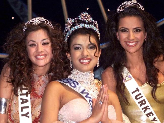 Miss India Priyanka Chopra (c) with second placed Giorgia Palmas (l) and third placed Yuksel Ak (r) after she won the 2000 Miss World beauty quest competition. Picture: Supplied