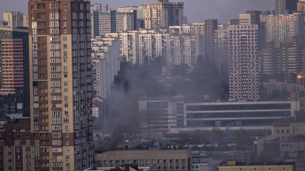 Smoke rises as Ukraine's capital is rocked by explosions during a drone attack in the early morning on October 17, 2022 in Kyiv. (Photo by Paula Bronstein /Getty Images)