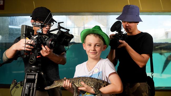 Public Television Service crew members Kuan Yu Chen and Wu Nan Chen are seen filming Darwin local Angus Copeland at Crocasaurus Cove. PICTURE: KERI MEGELUS