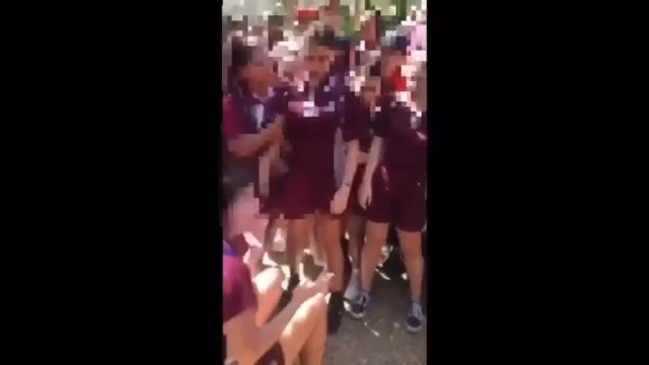 A group of students confront another at North Rockhampton State High School