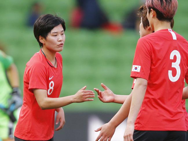 Ji So-yun of Korea Republic (centre) celebrates with teammates whilst New Zealand players look dejected after the Cup of Nations football match between Korea Republic and New Zealand at AAMI Park in Melbourne, Wednesday, March 6, 2019. (AAP Image/Daniel Pockett) NO ARCHIVING, EDITORIAL USE ONLY