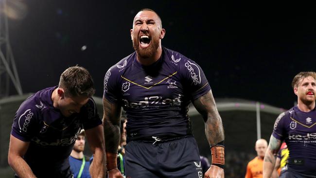 MELBOURNE, AUSTRALIA - SEPTEMBER 15: Nelson Asofa-Solomona of the Storm celebrates the try of Will Warbrick of the Storm during the NRL Semi Final match between Melbourne Storm and the Sydney Roosters at AAMI Park on September 15, 2023 in Melbourne, Australia. (Photo by Kelly Defina/Getty Images)